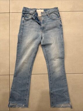 MOTHER Light Blue Flare Jeans with Raw Hem